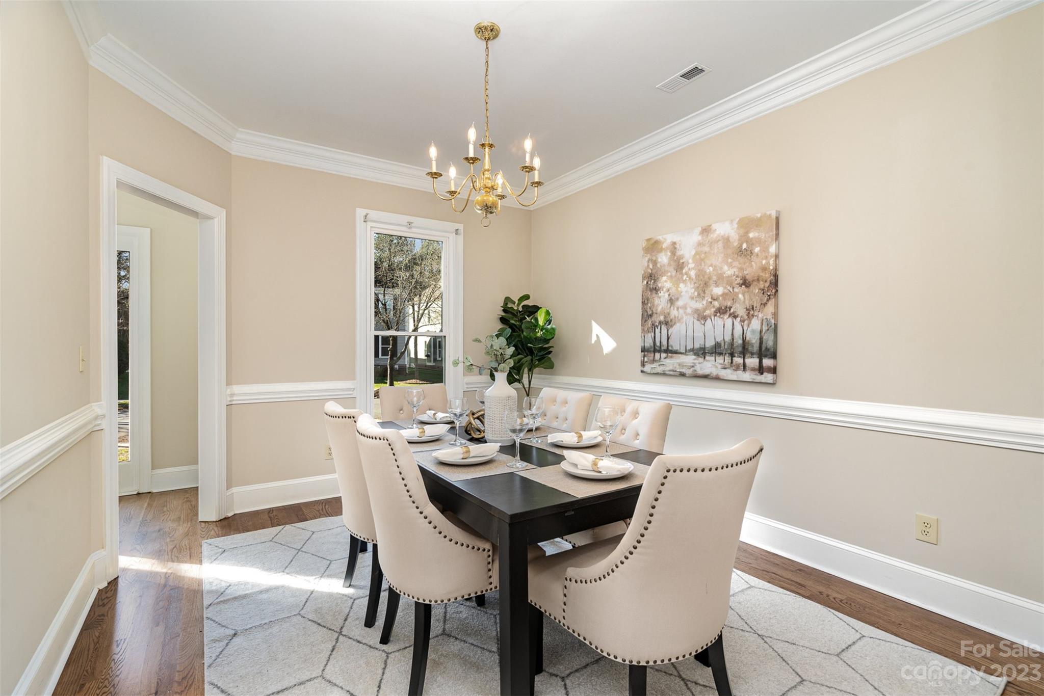 2906 Saintfield Place Charlotte, NC 28270 - Photo 16 of 37 a view of a dining room with furniture window and wooden floor