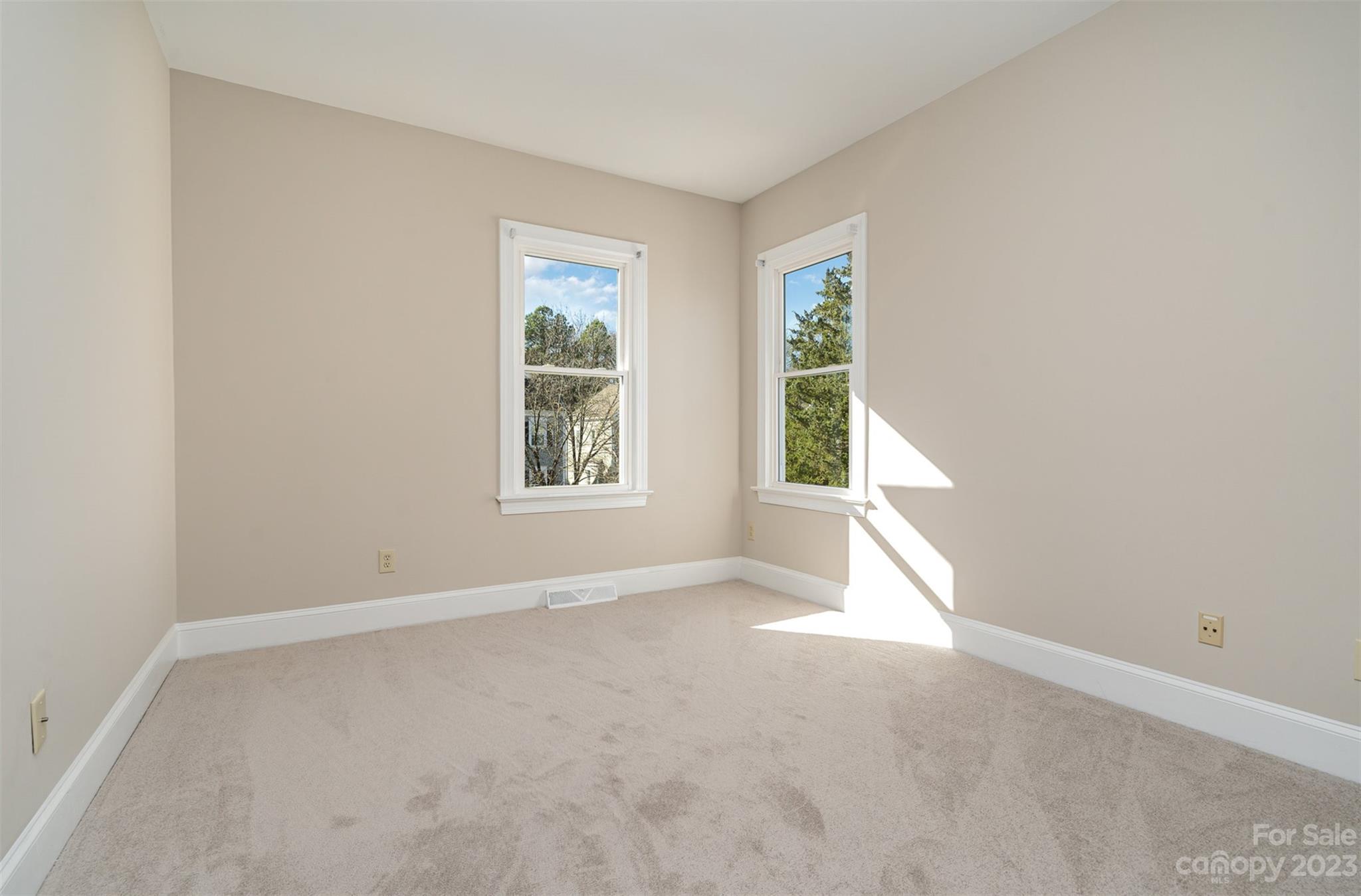 2906 Saintfield Place Charlotte, NC 28270 - Photo 23 of 37 an empty room with windows