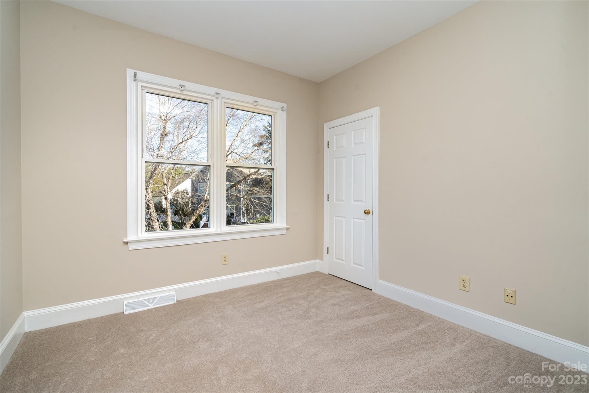 2906 Saintfield Place Charlotte, NC 28270 - Photo 24 of 37 an empty room with windows