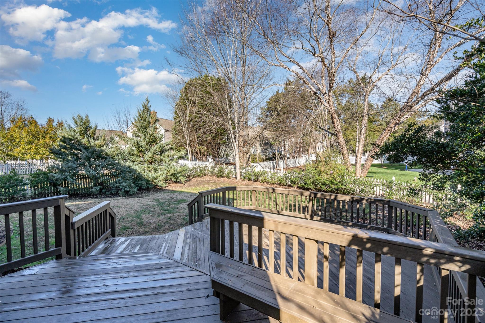2906 Saintfield Place Charlotte, NC 28270 - Photo 28 of 37 a view of deck and yard with trees