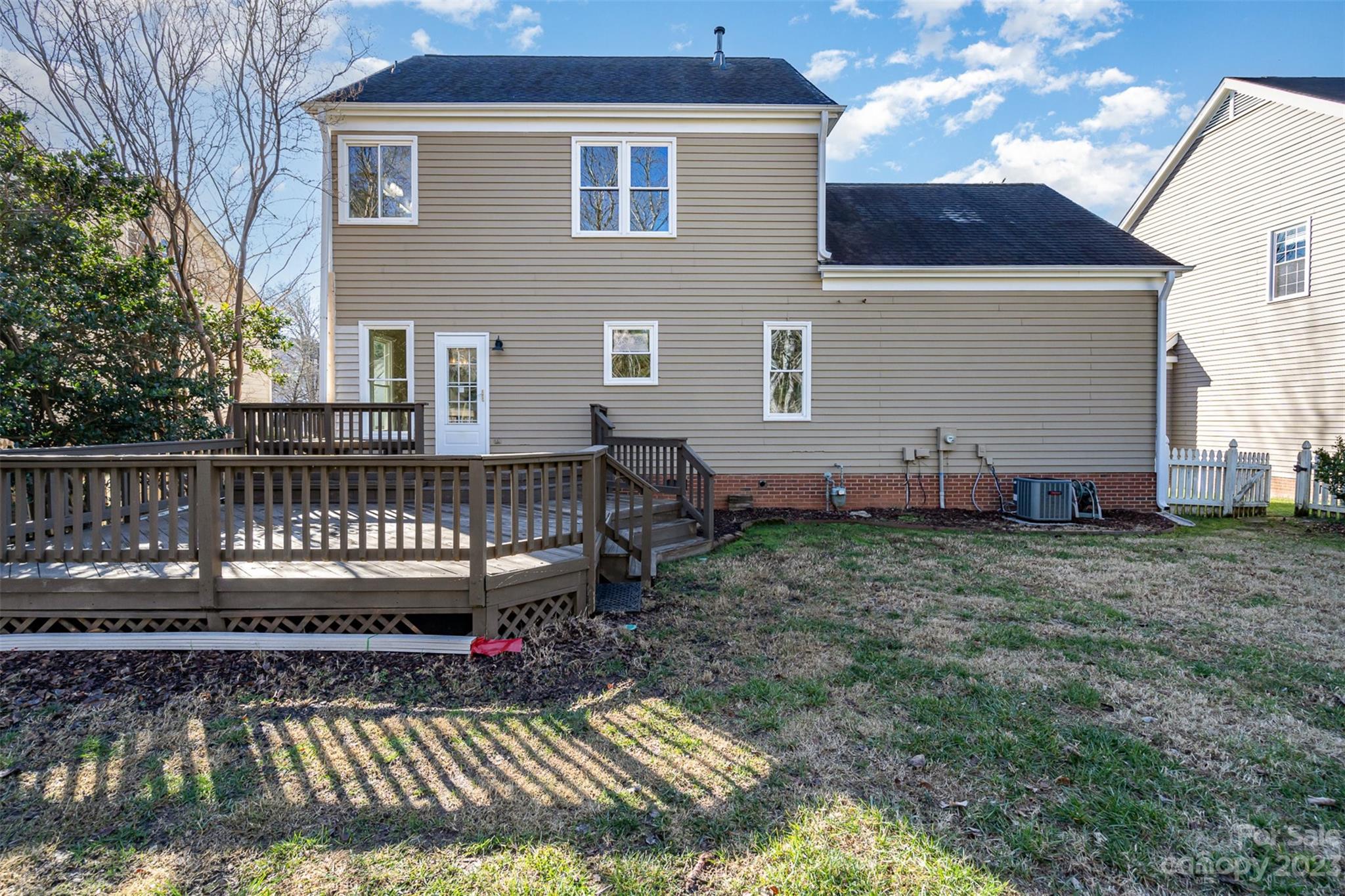2906 Saintfield Place Charlotte, NC 28270 - Photo 30 of 37 a view of a house with backyard and wooden floor