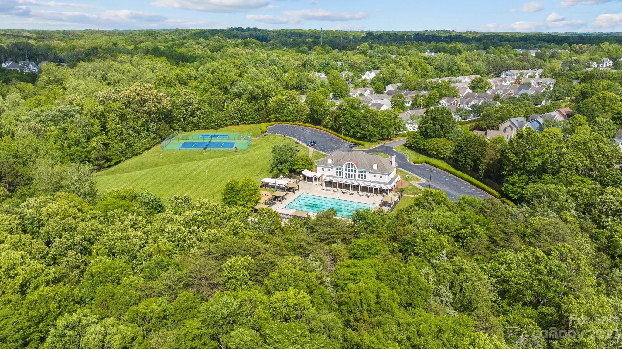 2906 Saintfield Place Charlotte, NC 28270 - Photo 37 of 37 a view of a yard with an outdoor seating and mountain view