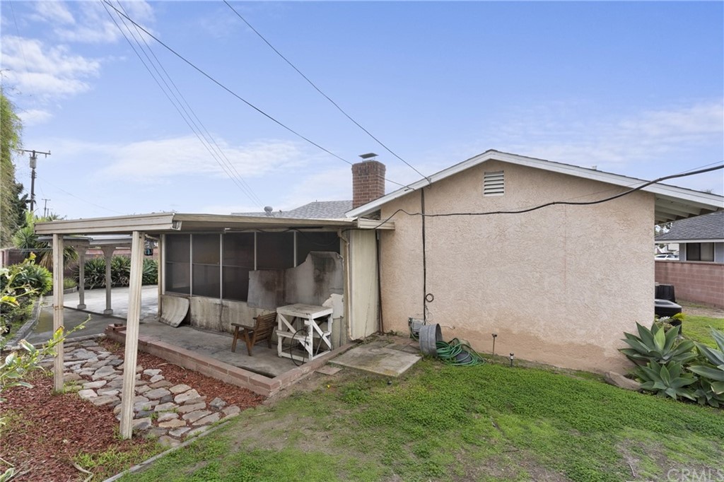 12042 Hackamore Road Garden Grove, CA 92840 - Photo 19 of 20 a front view of a house with garden