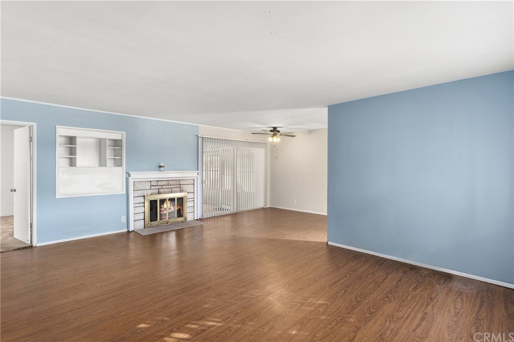12042 Hackamore Road Garden Grove, CA 92840 - Photo 3 of 20 a view of a livingroom with a fireplace