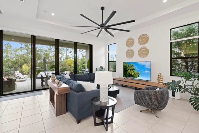 a bathroom with a shower and a sink a mirror