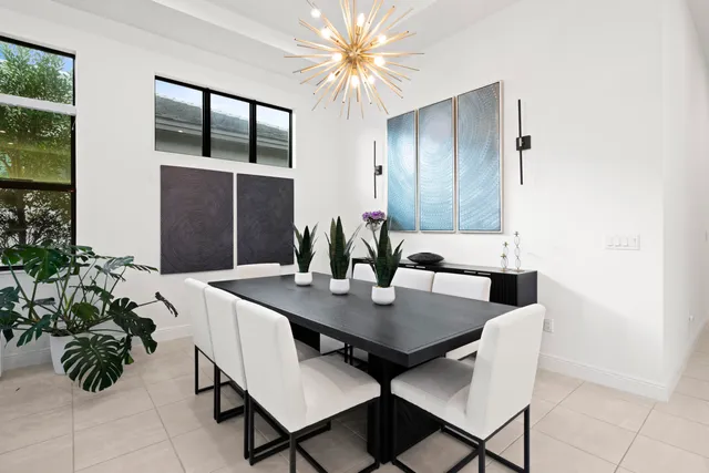 a view of a house with a yard patio and a garden