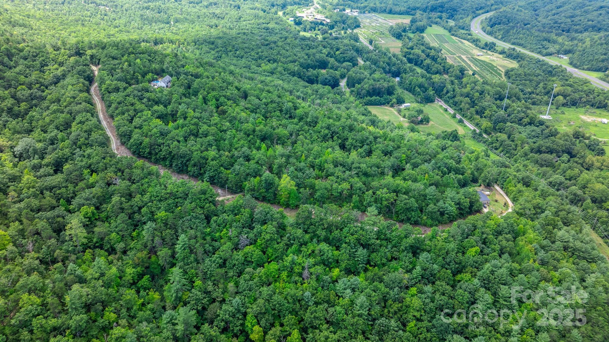 Tbd Old Linville Road Marion, NC 28752 - Photo 16 of 29 an aerial view of residential house with outdoor space and trees all around