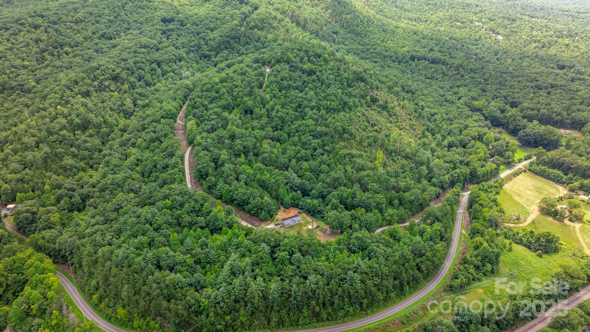 Tbd Old Linville Road Marion, NC 28752 - Photo 18 of 29 an aerial view of residential house with outdoor space and trees all around
