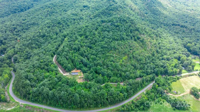 a view of a garden with a building