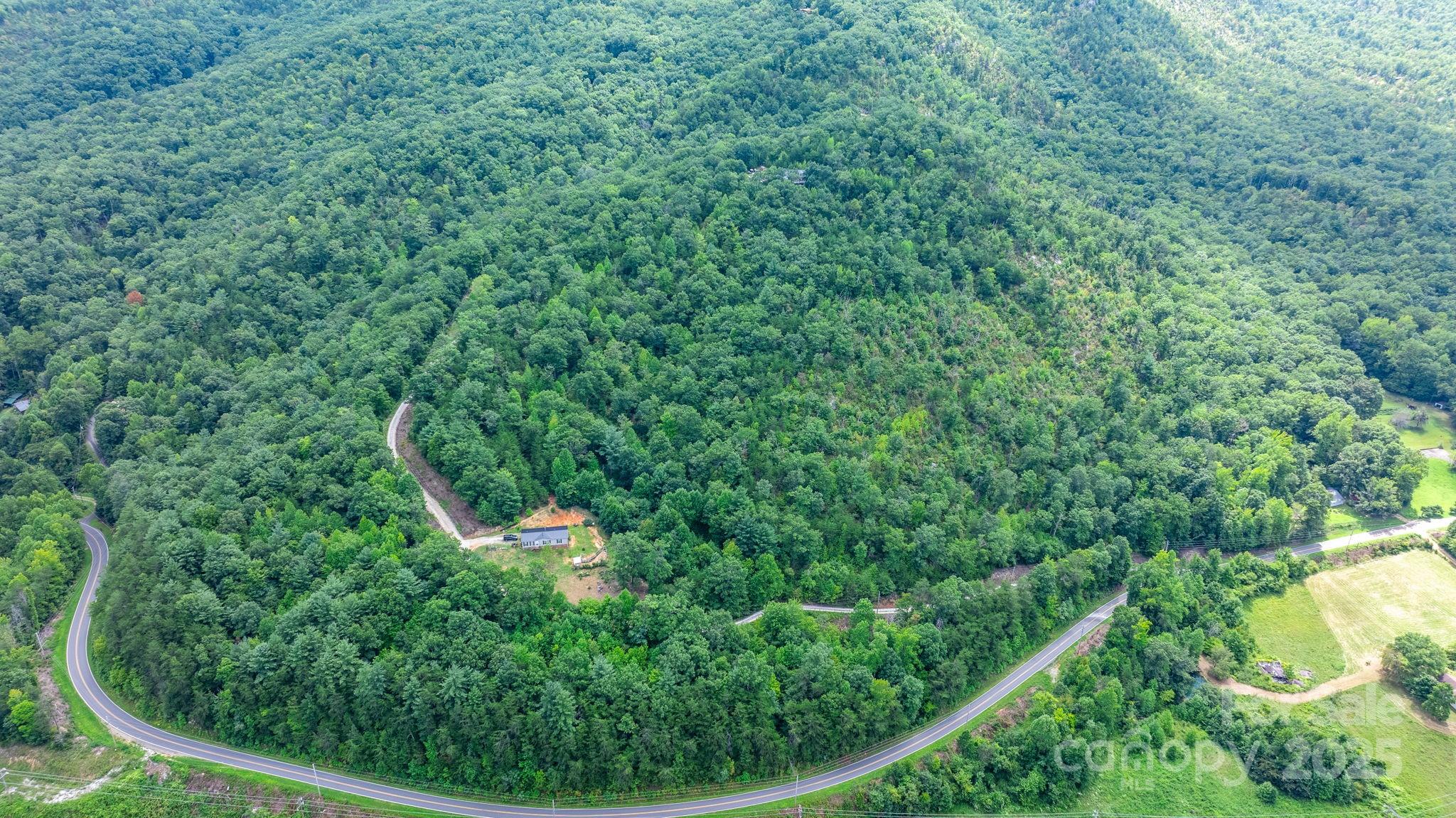 Tbd Old Linville Road Marion, NC 28752 - Photo 19 of 29 a view of a garden with a building