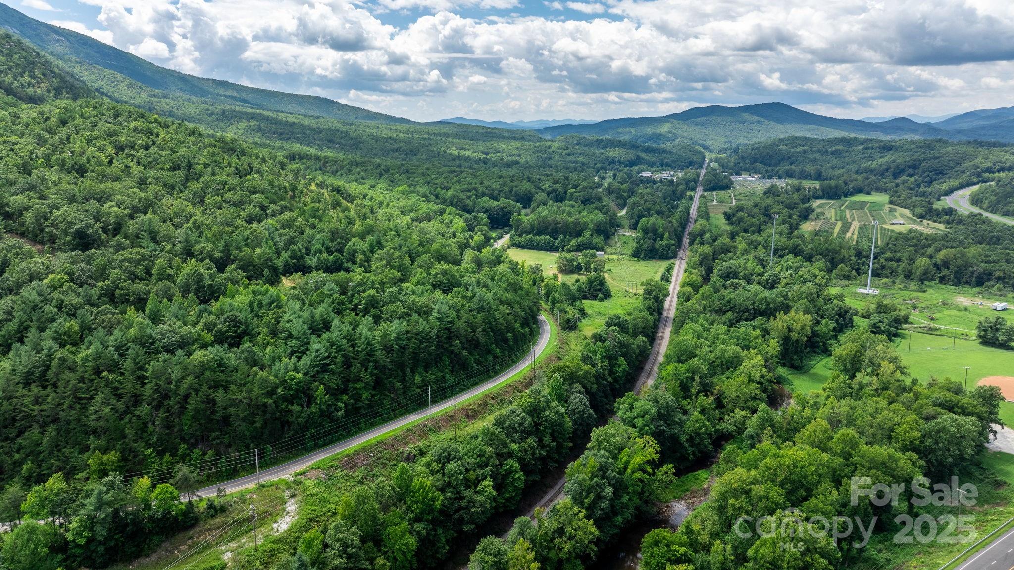 Tbd Old Linville Road Marion, NC 28752 - Photo 27 of 29 an aerial view of residential houses with outdoor space and trees