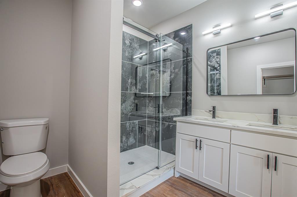 124 Brookview Drive Jacksboro, TX 76458 - Photo 17 of 34 a bathroom with a sink toilet and shower