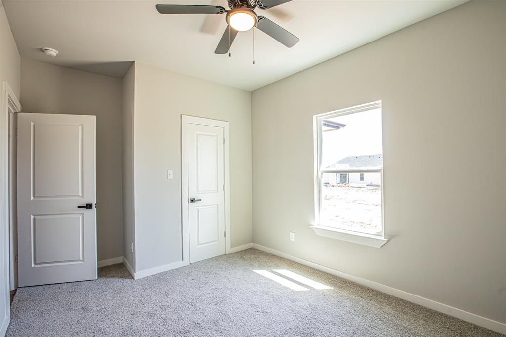 124 Brookview Drive Jacksboro, TX 76458 - Photo 24 of 34 a view of an empty room with a window