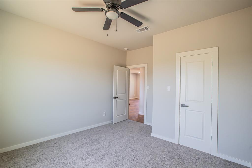 124 Brookview Drive Jacksboro, TX 76458 - Photo 31 of 34 wooden floor in an empty room