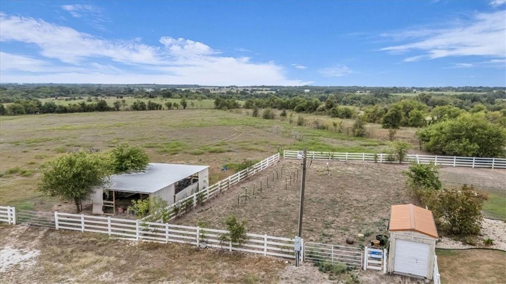 1064 Warren Road Lorena, TX 76655 - Photo 15 of 34 a view of a lake with a mountain in the background