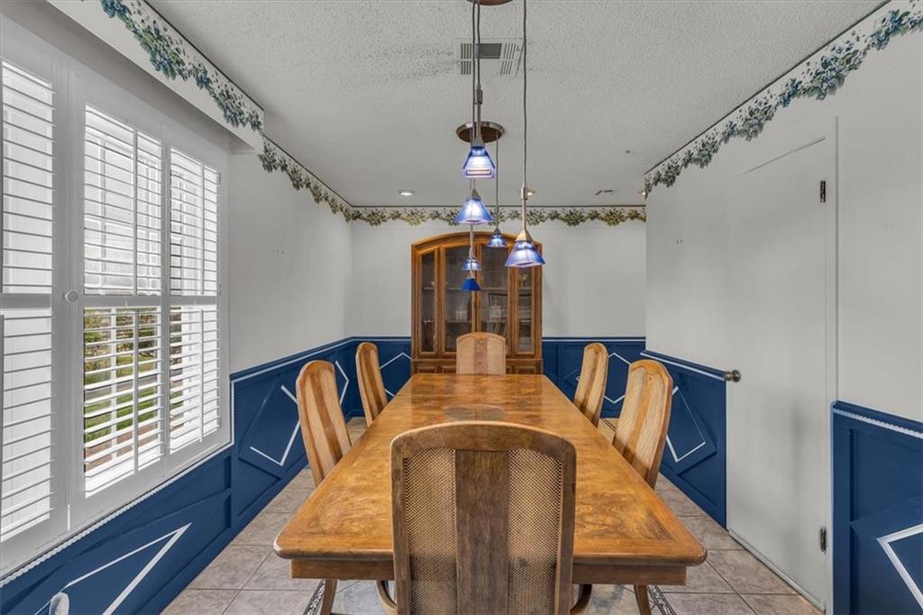 1064 Warren Road Lorena, TX 76655 - Photo 20 of 34 a view of a dining room with furniture window and wooden floor