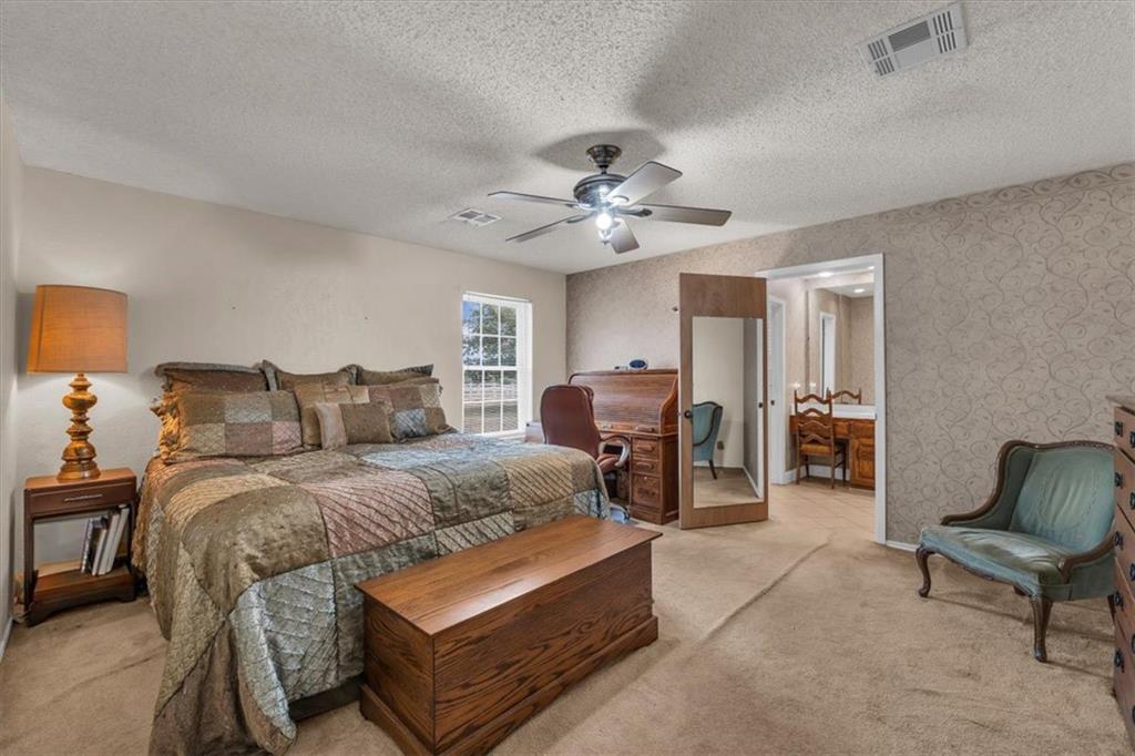 1064 Warren Road Lorena, TX 76655 - Photo 25 of 34 a living room with furniture and a ceiling fan
