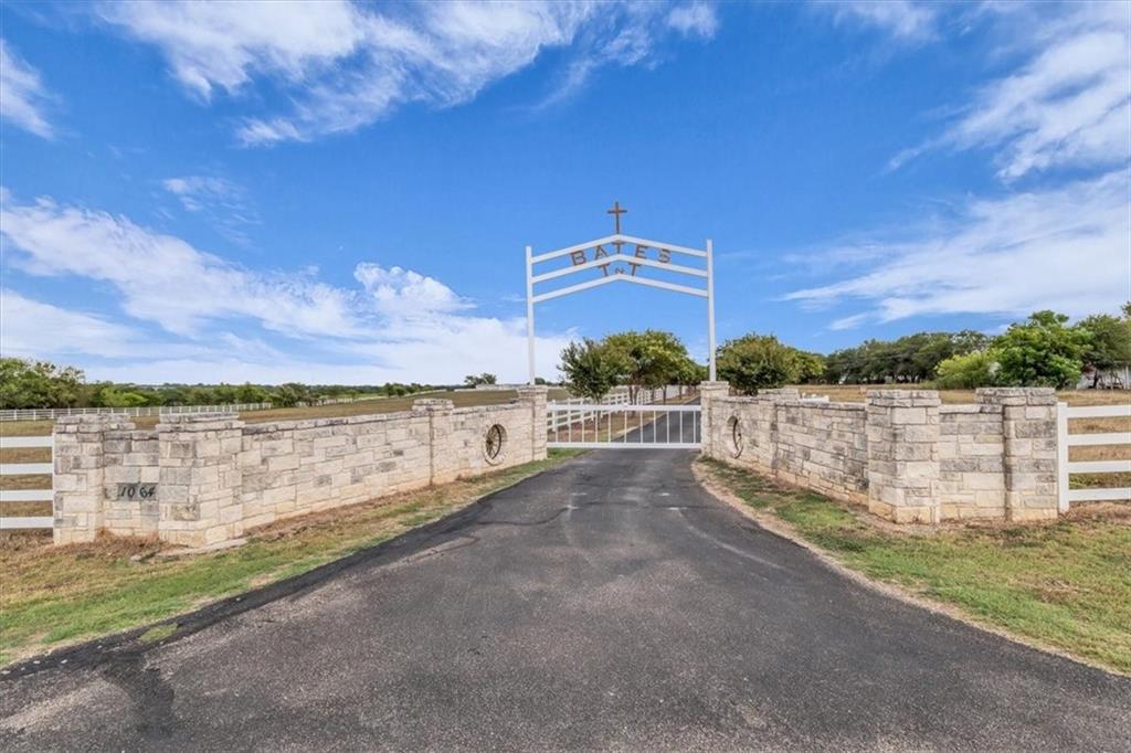 1064 Warren Road Lorena, TX 76655 - Photo 10 of 34 a view of a lake with big building in front of it