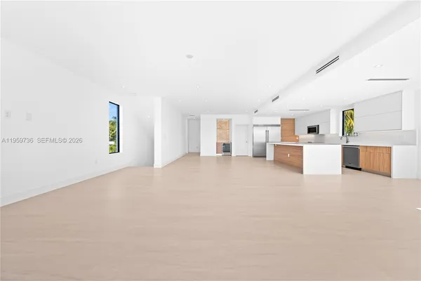a living room with furniture flat screen tv and a fireplace