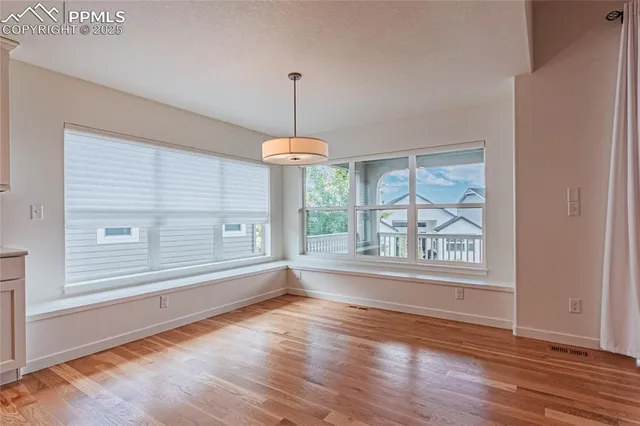 a kitchen with sink a stove and refrigerator