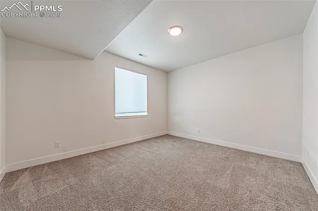 a white toilet sitting next to a bath tub and a shower