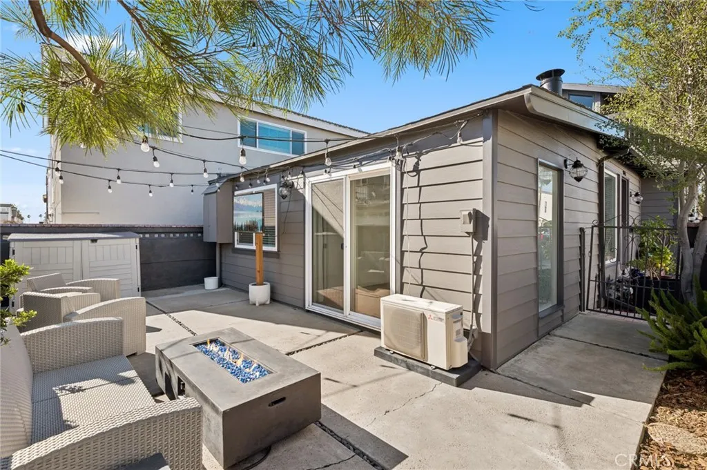 620 Acacia Avenue Corona del Mar, CA 92625 - Photo 21 of 24 a view of a dinning table and chair in the patio