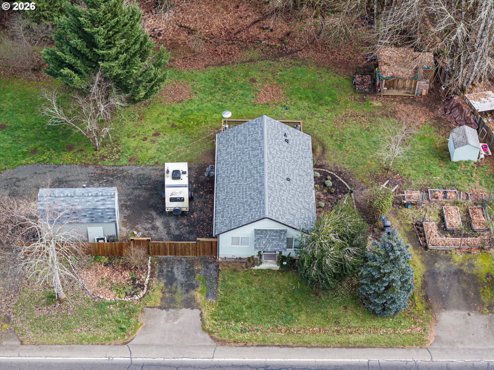 74129 London Road Cottage Grove, OR 97424 - Photo 2 of 44 an aerial view of a house with a yard