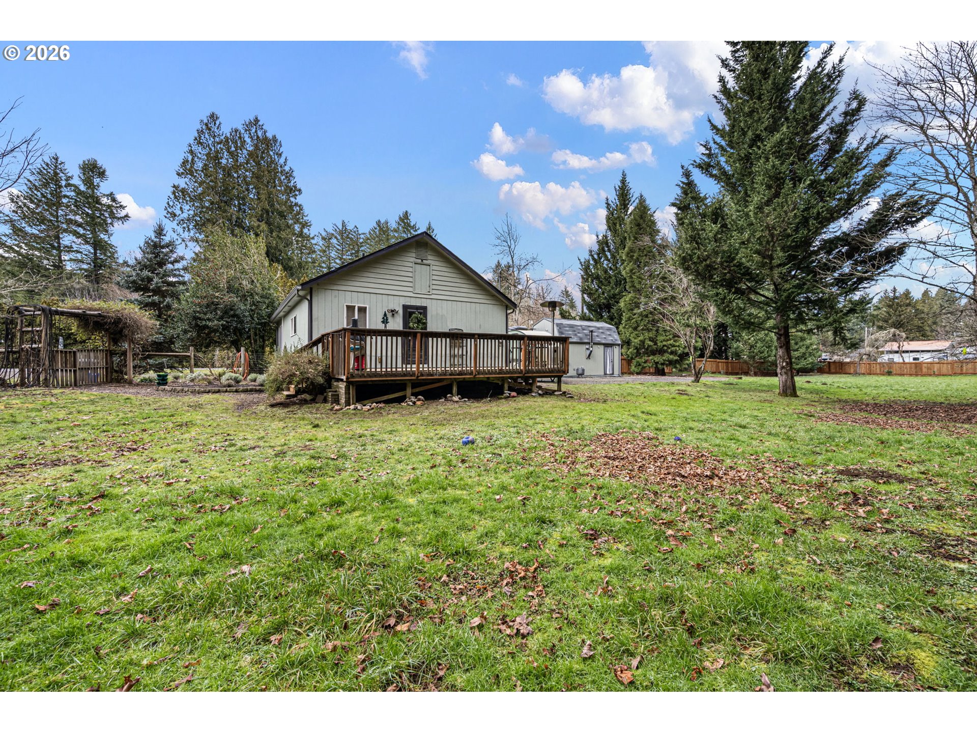 74129 London Road Cottage Grove, OR 97424 - Photo 24 of 44 a front view of a house with a yard
