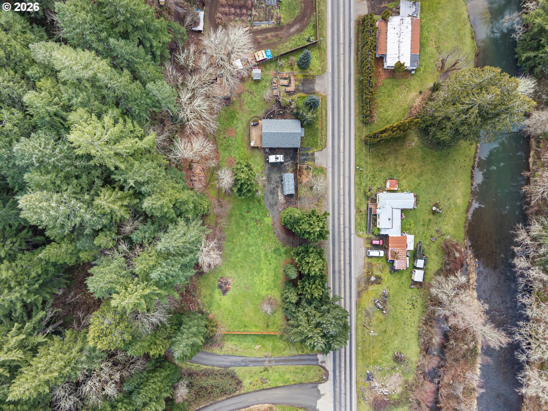 74129 London Road Cottage Grove, OR 97424 - Photo 37 of 44 an aerial view of a house having patio