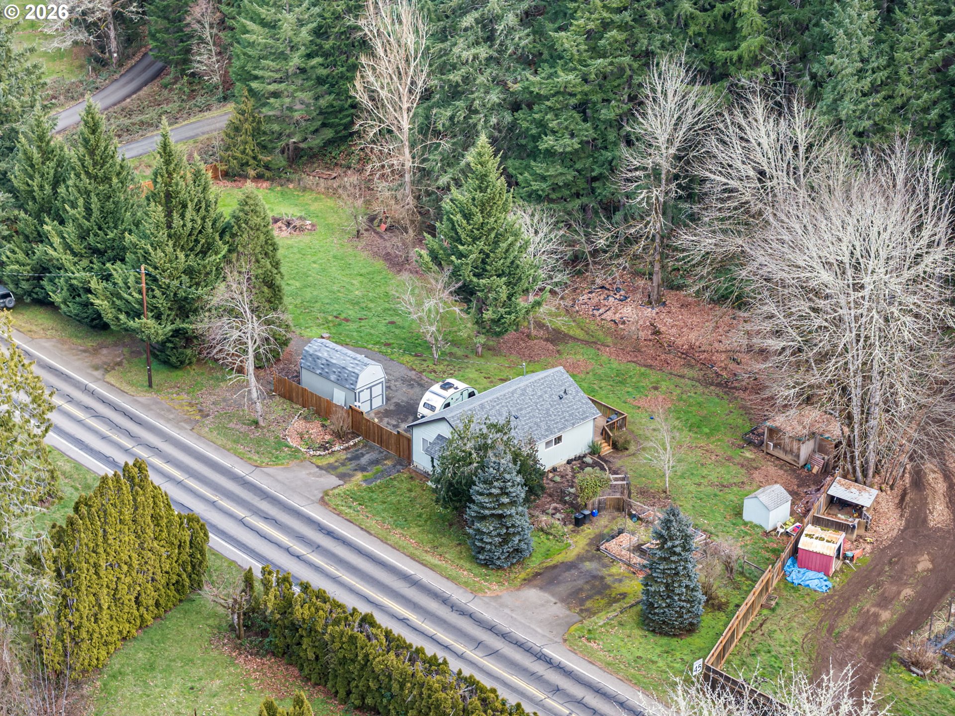 74129 London Road Cottage Grove, OR 97424 - Photo 41 of 44 a view of a yard with potted plants