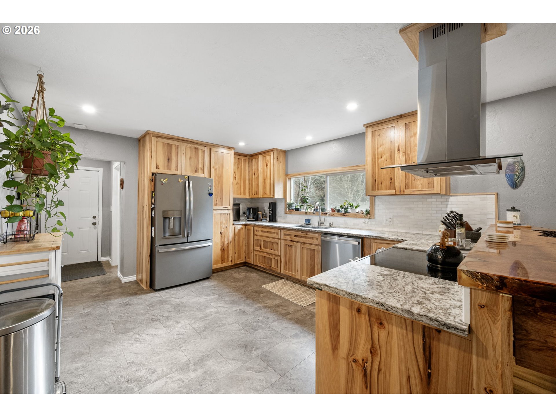 74129 London Road Cottage Grove, OR 97424 - Photo 8 of 44 a kitchen with a refrigerator and a sink