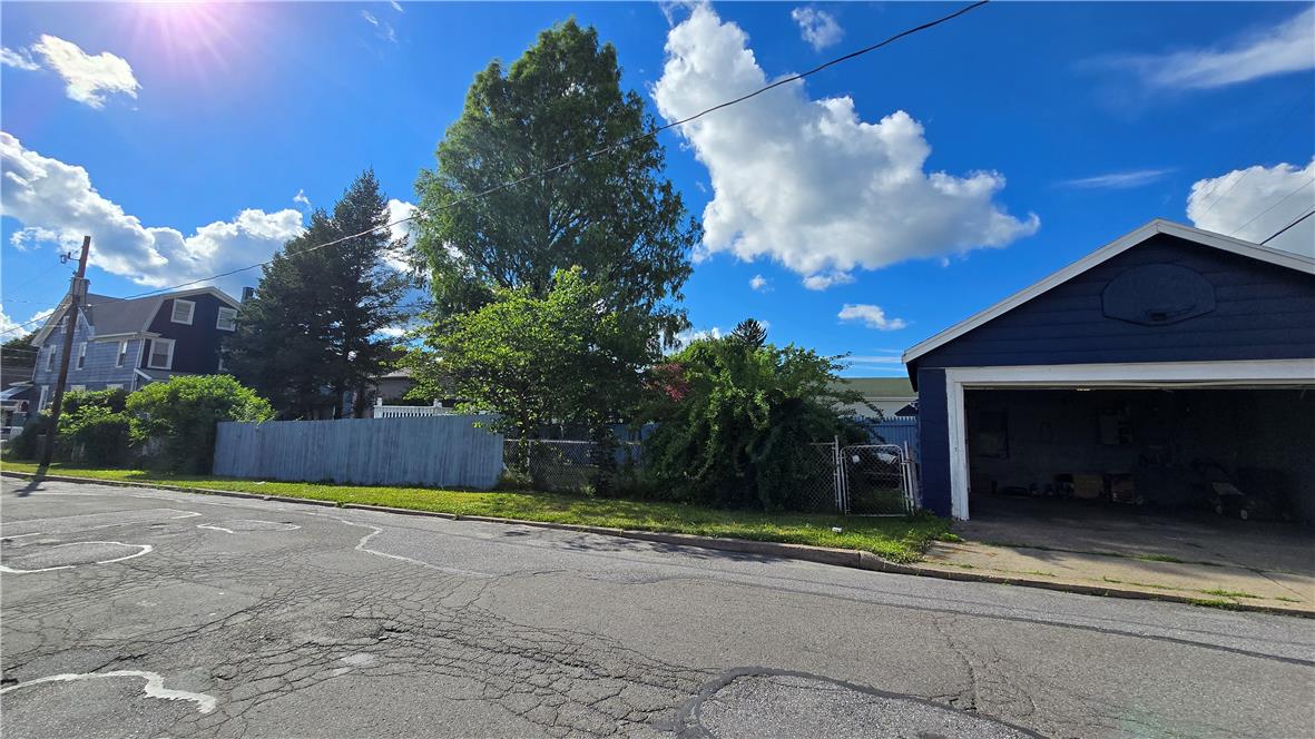 883 North Locust Street Hazleton, PA 18201 - Photo 37 of 83 A quaint residence with a detached garage and fenced yard, perfect for comfortable living.