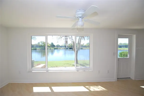 a view of lot of window and a kitchen