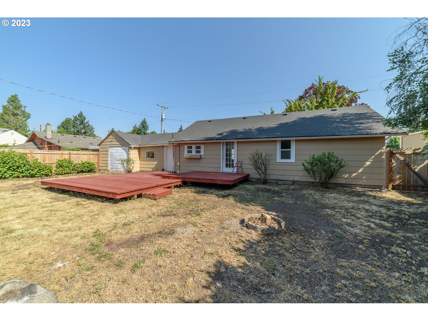 2705 G Street Springfield, OR 97477 - Photo 25 of 32 a aerial view of a house with a yard