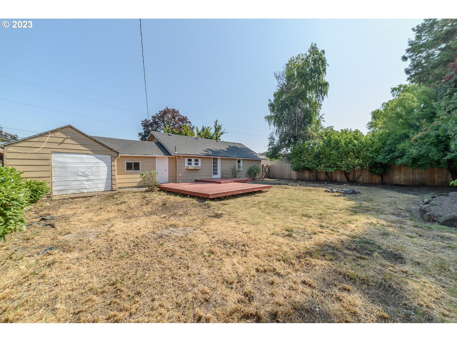 2705 G Street Springfield, OR 97477 - Photo 26 of 32 a aerial view of a house with a yard