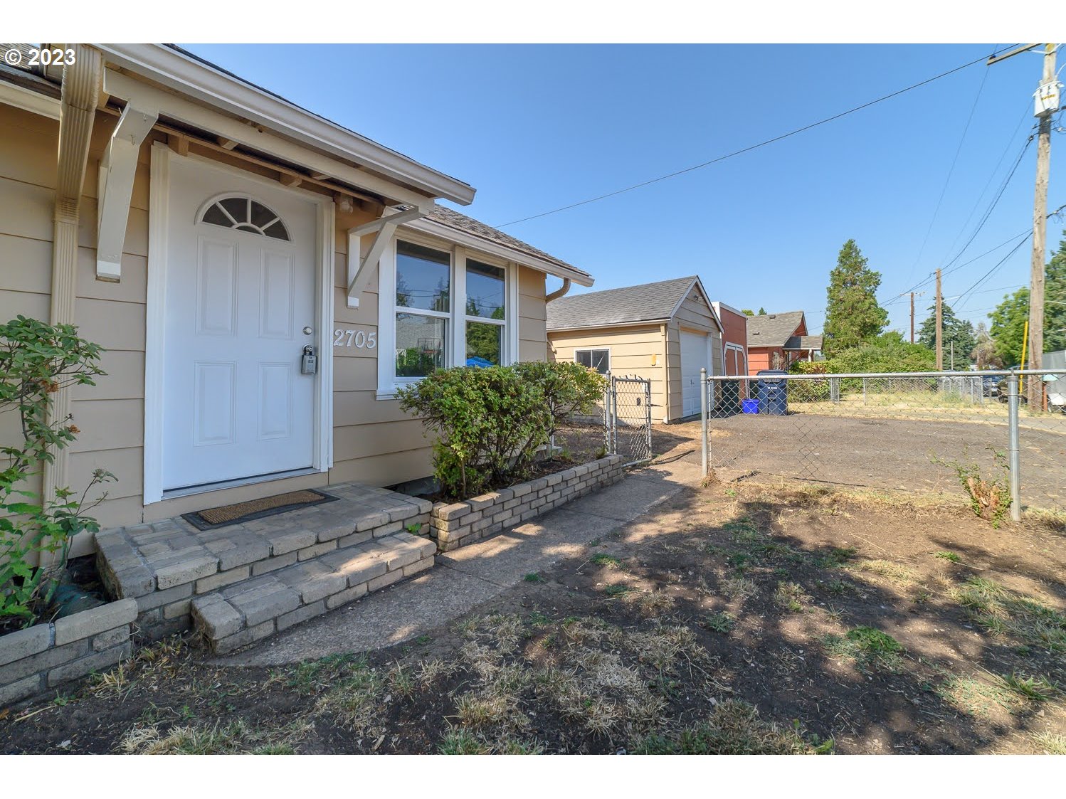 2705 G Street Springfield, OR 97477 - Photo 3 of 32 a view of a house with a yard