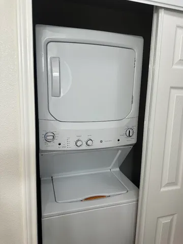 a view of a room that has a window in it