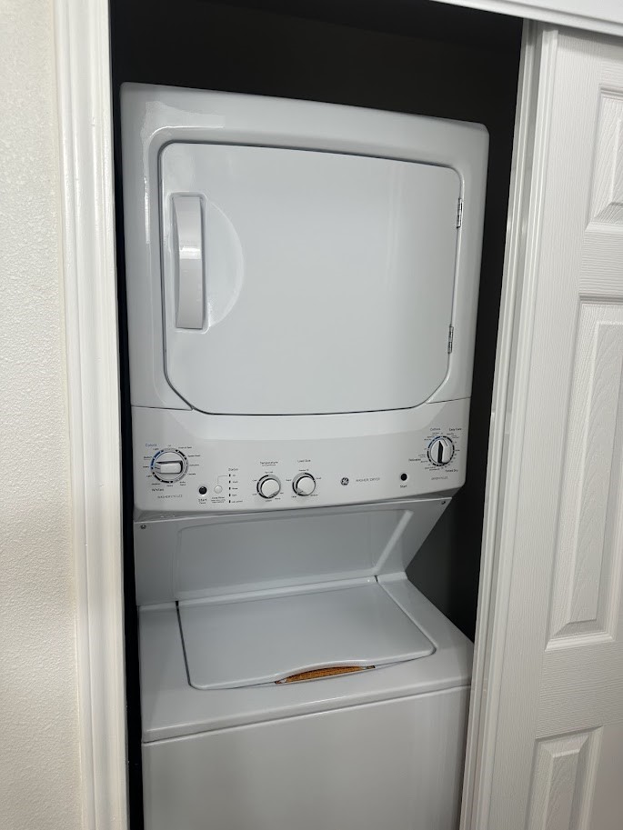 48 Vigilante Point Blank, TX 77364 - Photo 12 of 20 a close up view of a washer and dryer