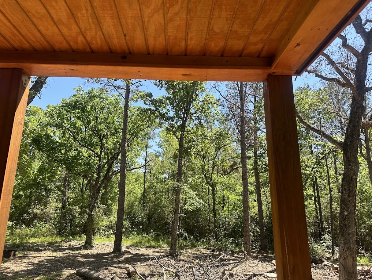 48 Vigilante Point Blank, TX 77364 - Photo 16 of 20 a view of a back yard from a window