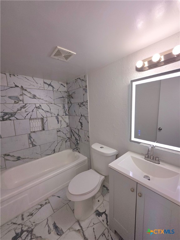1901 North 10th Street, Unit 9 Killeen, TX 76541 - Photo 5 of 10 a bathroom with a sink a toilet and shower