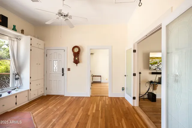 a view of a living room and hardwood floor