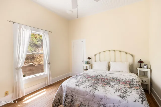 a view of a livingroom with a dinning area hardwood floor and a living room