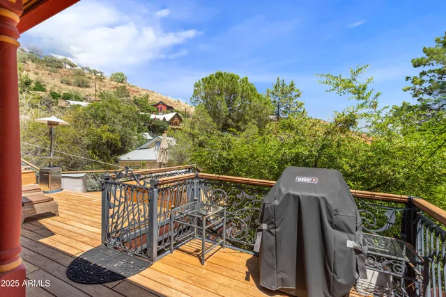 a view of a balcony with chairs