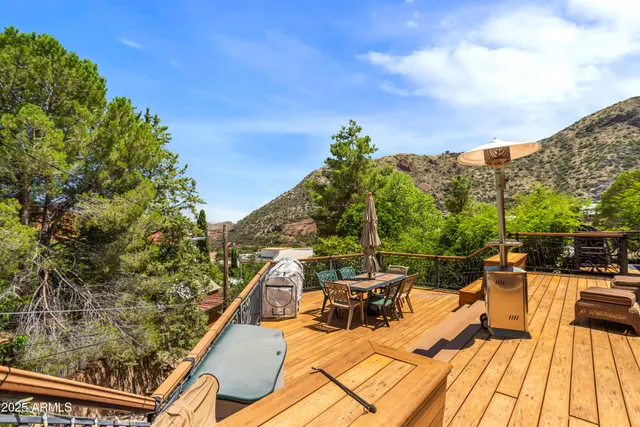 a view of a balcony with chairs