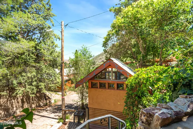 an aerial view of residential house with an outdoor space