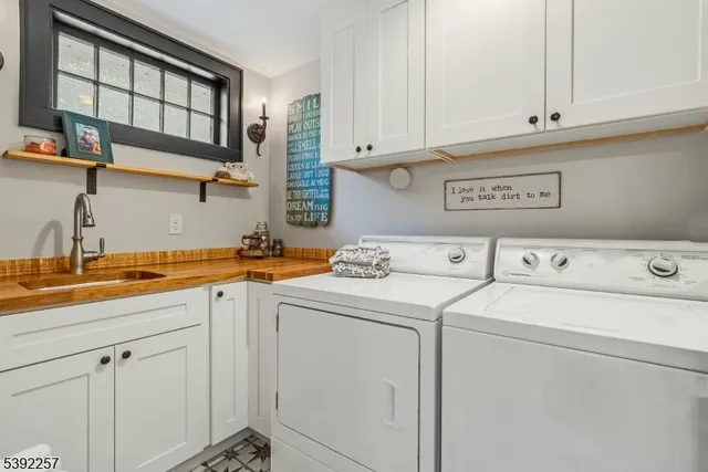 a bedroom with furniture and wooden floor