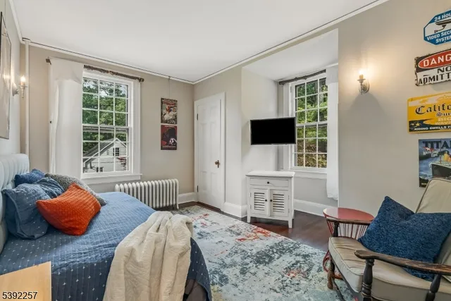 a room with a bed and a window