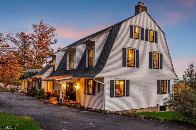 a front view of a house with yard