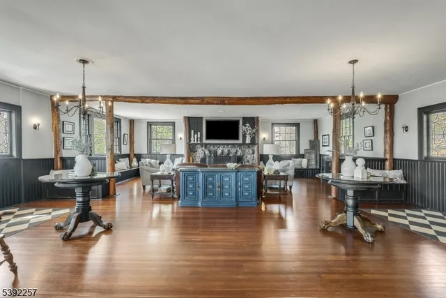 a view of a dining room with furniture and window
