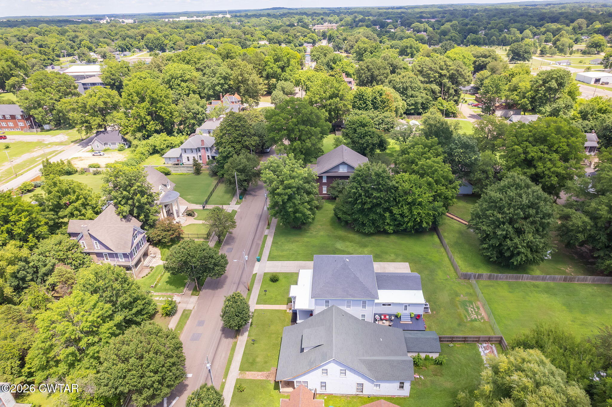 554 East Main Street Jackson, TN 38301 - Photo 52 of 60 an aerial view of residential houses with outdoor space and street view